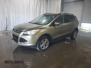 2014 Ford Escape SE with VIN 1FMCU9GX9EUB20982, listed as a Copart auction lot 60475365 with 129,239 mi miles and Clean title. Bid and sale history available at DreamBid. Image 1.