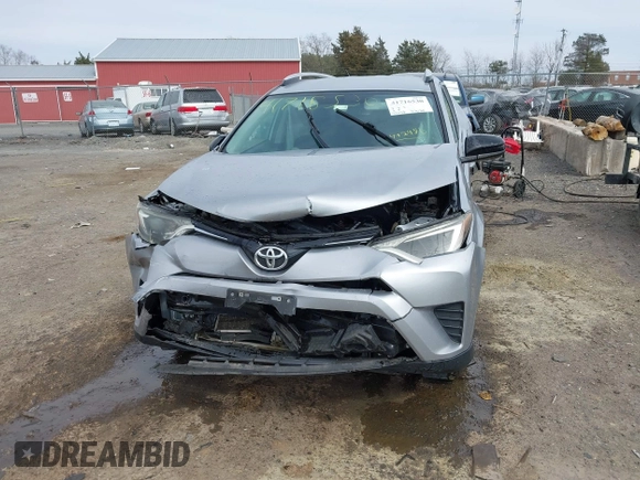 2016 Toyota RAV4 LE with VIN 2T3BFREV8GW432986, listed as a IAAI auction lot 41716530 with 143,442 mi miles. Bid and sale history available at carsss.com. Image 13.