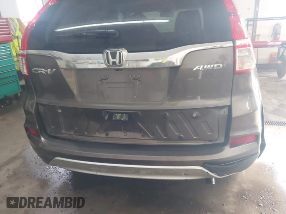 2015 Honda CR-V EX with VIN 2HKRM4H56FH662101, listed as a IAAI auction lot 41623155 with 173,554 mi miles and . Bid and sale history available at DreamBid. Image 6.