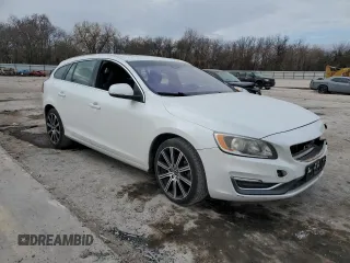 2015 Volvo V60 T5 Drive-E Premier with VIN YV140MEK2F1233829, listed as a Copart auction lot 83320544 with 143,632 mi miles and Salvage Title. Bid and sale history available at carsss.com. Image 4.