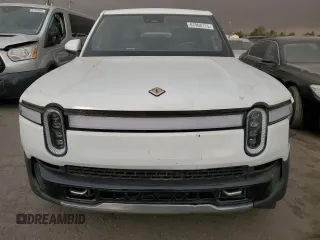 2022 Rivian R1T Adventure z VIN 7FCTGAAA9NN014280, wystawiony jako Copart lot #87908175 z przebiegiem 28 601 mil mil oraz Szkody całkowita. Historia ofert i sprzedaży dostępna na DreamBid. Obrazek 5.
