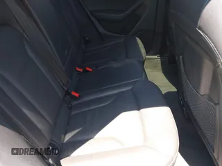 2018 Audi Q3 Premium with VIN WA1BCCFS4JR000455, listed as a IAAI auction lot 42042811 with 57,354 mi miles. Bid and sale history available at carsss.com. Image 8.