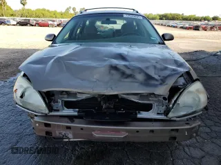 2002 Ford Taurus SE z VIN 1FAFP58S02G278065, wystawiony jako Copart lot #53030885 z przebiegiem 131 984 mil mil oraz Szkoda całkowita • Salvage title. Historia ofert i sprzedaży dostępna na DreamBid. Obrazek 5.