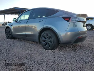 2024 Tesla Model Y Long Range z VIN 7SAYGAEEXRF211507, wystawiony jako Copart lot #56432715 z przebiegiem Nie podano mil oraz Szkoda całkowita • Salvage title. Historia ofert i sprzedaży dostępna na DreamBid. Obrazek 2.