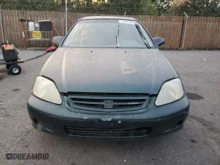 1999 Honda Civic DX with VIN 1HGEJ6223XL022105, listed as a Copart auction lot 82823084 with 288,187 mi miles and Salvage Title. Bid and sale history available at carsss.com. Image 5.