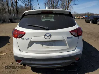 2015 Mazda CX-5 Touring with VIN JM3KE4CY6F0470164, listed as a Copart auction lot 48616815 with 0 mi miles and Salvage Title. Bid and sale history available at carsss.com. Image 6.