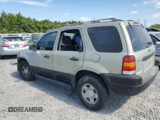 2004 Ford Escape with VIN 1FMCU02194DA23228, listed as a Copart auction lot 72161464 with 167,233 mi miles and Salvage title. Bid and sale history available at DreamBid. Image 2.