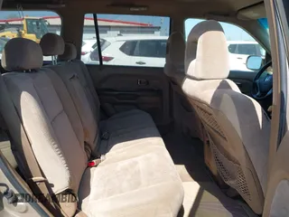 2004 Honda Pilot EX with VIN 2HKYF18464H599512, listed as a IAAI auction lot 42098213 with 224,054 mi miles and . Bid and sale history available at DreamBid. Image 8.