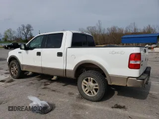 2005 Ford F-150 XLT with VIN 1FTPW14565KE92649, listed as a Copart auction lot 51474055 with 299,766 mi miles and Salvage Title. Bid and sale history available at carsss.com. Image 2.