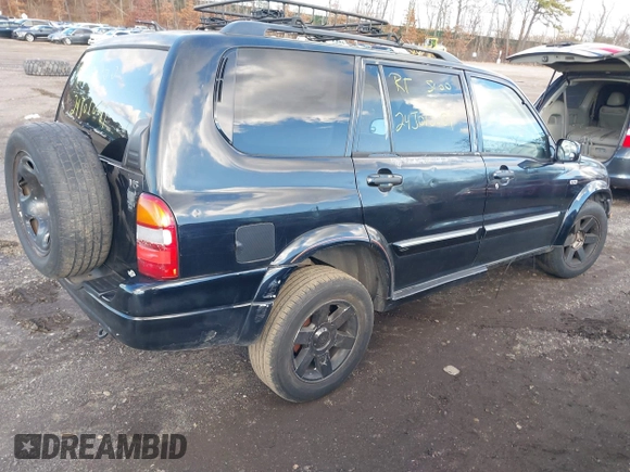 2001 Suzuki XL-7 LX with VIN JS3TY92V114101255, listed as a IAAI auction lot 40995688 with 1 mi miles. Bid and sale history available at carsss.com. Image 4.