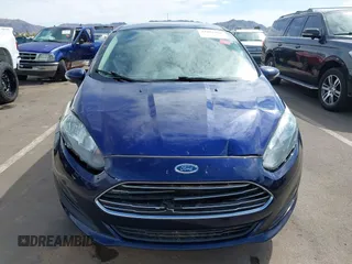 2016 Ford Fiesta SE with VIN 3FADP4EJ4GM199945, listed as a IAAI auction lot 41881260 with 98,945 mi miles. Bid and sale history available at carsss.com. Image 6.
