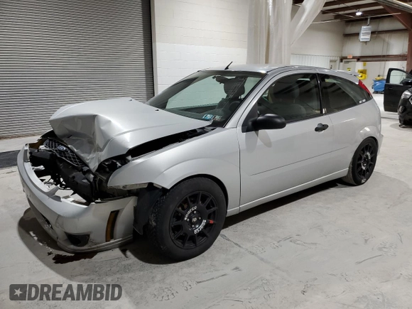 2007 Ford Focus S with VIN 1FAHP31N57W113952, listed as a Copart auction lot 51070245 with 149,809 mi miles and Salvage Title. Bid and sale history available at DreamBid. Image 1.