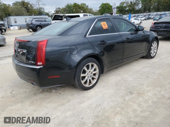2009 Cadillac CTS AWD w/1SA with VIN 1G6DH577590123416, listed as a Copart auction lot 48297495 with 142,728 mi miles and Salvage Title. Bid and sale history available at carsss.com. Image 3.