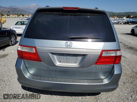 2005 Honda Odyssey EX with VIN 5FNRL38405B099581, listed as a Copart auction lot 52970815 with 218,225 mi miles and Salvage Title. Bid and sale history available at carsss.com. Image 6.