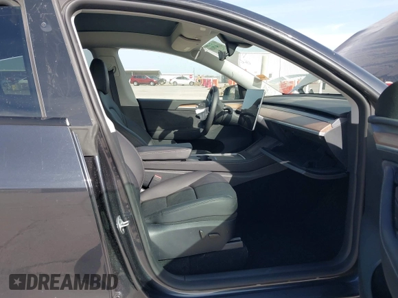 2024 Tesla Model Y with VIN 7SAYGDED9RF044789, listed as a IAAI auction lot 41817318 with Not Provided miles and . Bid and sale history available at DreamBid. Image 5.