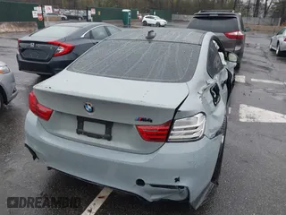 2017 BMW M4 with VIN WBS3R9C53HK709173, listed as a IAAI auction lot 41978162 with 105,427 mi miles. Bid and sale history available at carsss.com. Image 4.