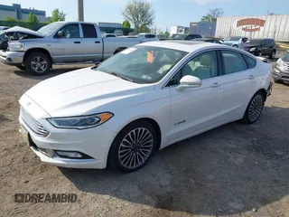 2017 Ford Fusion Hybrid Titanium с VIN 3FA6P0RU7HR148191, выставлен на аукционе IAAI как лот 42167708 с пробегом 72 708 миль миль и . История ставок и продаж доступна на DreamBid. Изображение 23.