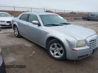 2007 Chrysler 300 Limited with VIN 2C3KA53G97H664187, listed as a IAAI auction lot 41699625 with 323,544 mi miles. Bid and sale history available at carsss.com. Image 1.