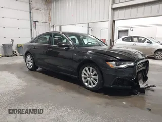 2014 Audi A6 Prestige with VIN WAUHMAFC2EN114703, listed as a IAAI auction lot 42075576 with 121,505 mi miles and . Bid and sale history available at DreamBid. Image 1.