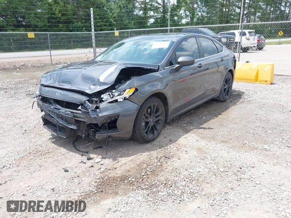 2020 Ford Fusion SE z VIN 3FA6P0HD6LR160147, wystawiony jako IAAI lot #42499983 z przebiegiem 73 971 mil mil oraz . Historia ofert i sprzedaży dostępna na DreamBid. Obrazek 18.