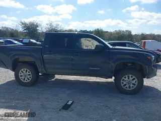 2024 Toyota Tacoma 4WD SR5 with VIN 3TYLB5JNXRT031852, listed as a IAAI auction lot 41779552 with 9,625 mi miles. Bid and sale history available at carsss.com. Image 13.