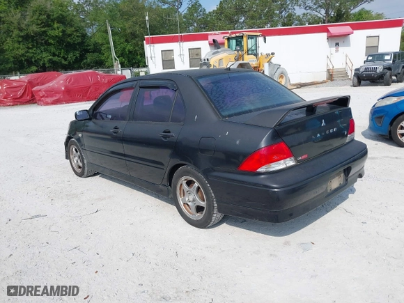2002 Mitsubishi Lancer OZ-Rally with VIN JA3AJ86E22U074890, listed as a IAAI auction lot 42029591 with 235,818 mi miles. Bid and sale history available at carsss.com. Image 3.