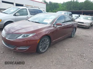 2015 Lincoln MKZ Hybrid with VIN 3LN6L2LU2FR607310, listed as a IAAI auction lot 42115513 with 80,418 mi miles and . Bid and sale history available at DreamBid. Image 2.