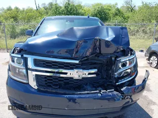 2018 Chevrolet Tahoe LT with VIN 1GNSCBKC0JR138385, listed as a IAAI auction lot 41977300 with 104,987 mi miles and . Bid and sale history available at DreamBid. Image 12.