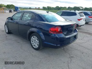 2014 Dodge Avenger SE with VIN 1C3CDZAB1EN111015, listed as a IAAI auction lot 42330669 with 82,265 mi miles and . Bid and sale history available at DreamBid. Image 3.