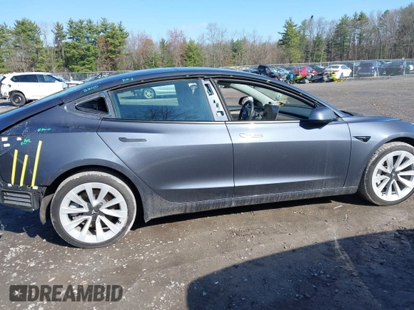 2022 Tesla Model 3 Long Range with VIN 5YJ3E1EB0NF365284, listed as a IAAI auction lot 41899706 with 36,463 mi miles and . Bid and sale history available at DreamBid. Image 14.