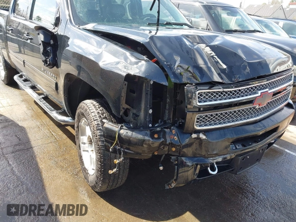 2013 Chevrolet Silverado 1500 LT with VIN 3GCPKSE71DG329253, listed as a IAAI auction lot 41723597 with 164,539 mi miles. Bid and sale history available at carsss.com. Image 6.