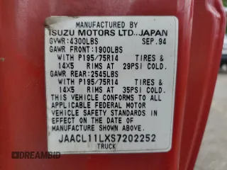 1995 Isuzu Pickup S z VIN JAACL11LXS7202252, wystawiony jako Copart lot #70393254 z przebiegiem 290 933 mil mil oraz Szkody całkowita. Historia ofert i sprzedaży dostępna na DreamBid. Obrazek 12.