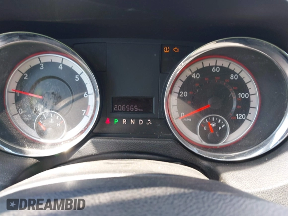 2012 Dodge Grand Caravan SXT with VIN 2C4RDGCGXCR277505, listed as a IAAI auction lot 42194492 with 206,565 mi miles and . Bid and sale history available at DreamBid. Image 7.