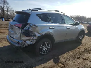 2018 Toyota RAV4 LE with VIN JTMBFREVXJJ220838, listed as a Copart auction lot 52870975 with 125,456 mi miles and Salvage Title. Bid and sale history available at carsss.com. Image 3.