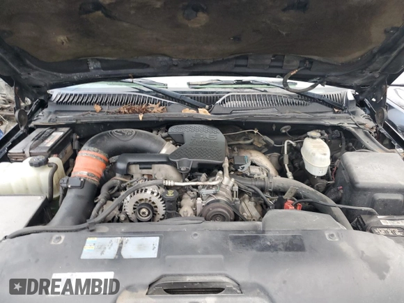 2005 GMC Sierra 3500 DRW Work Trk z VIN 1GTJK33235F863716, wystawiony jako Copart lot #84085004 z przebiegiem 233 369 mil mil oraz Szkoda całkowita • Salvage title. Historia ofert i sprzedaży dostępna na DreamBid. Obrazek 11.