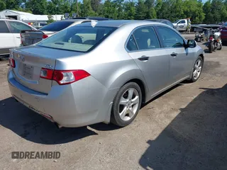 2009 Acura TSX with VIN JH4CU26659C021798, listed as a IAAI auction lot 42565155 with 196,024 mi miles and . Bid and sale history available at DreamBid. Image 4.