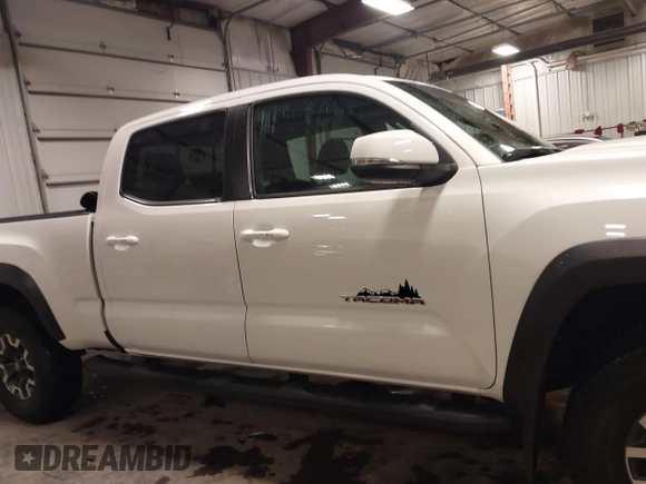 2021 Toyota Tacoma 4WD SR5 with VIN 3TMDZ5BN6MM113743, listed as a IAAI auction lot 41413775 with 24,735 mi miles. Bid and sale history available at carsss.com. Image 14.