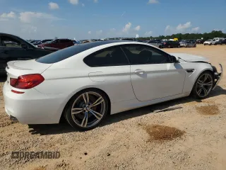 2014 BMW M6 z VIN WBSLX9C53ED160497, wystawiony jako Copart lot #62826444 z przebiegiem 55 639 mil mil oraz Szkody całkowita. Historia ofert i sprzedaży dostępna na DreamBid. Obrazek 3.