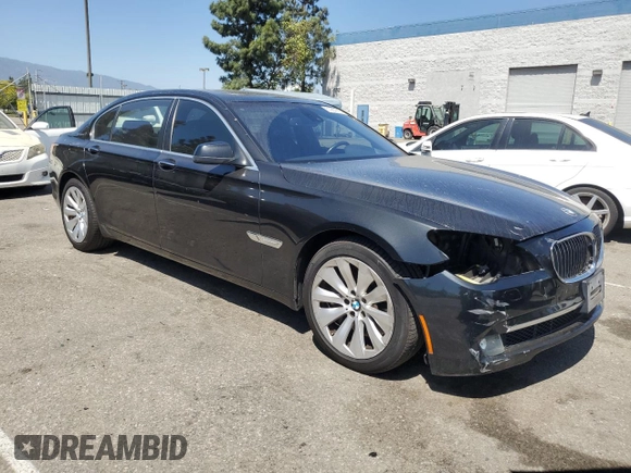 2011 BMW 7 Series with VIN WBAKX8C55BC198292, listed as a Copart auction lot 57907915 with 76,478 mi miles and Salvage title. Bid and sale history available at DreamBid. Image 4.