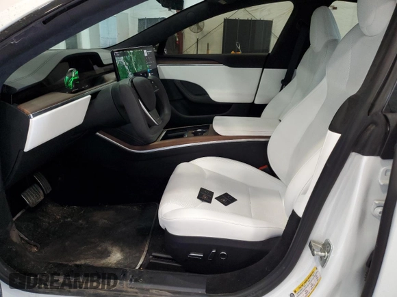 2024 Tesla Model S with VIN 5YJSA1E56RF538488, listed as a Copart auction lot 54702885 with 9,470 mi miles and Salvage title. Bid and sale history available at DreamBid. Image 7.
