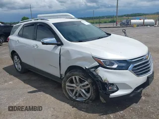 2021 Chevrolet Equinox Premier with VIN 3GNAXXEV2MS172873, listed as a IAAI auction lot 42527210 with 64,285 mi miles and . Bid and sale history available at DreamBid. Image 1.