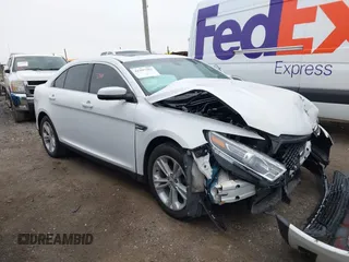 2018 Ford Taurus SEL z VIN 1FAHP2H81JG119145, wystawiony jako IAAI lot #41997302 z przebiegiem 61 467 mil mil oraz . Historia ofert i sprzedaży dostępna na DreamBid. Obrazek 1.