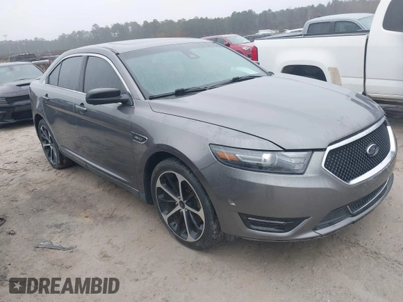 2014 Ford Taurus SHO with VIN 1FAHP2KT0EG171336, listed as a IAAI auction lot 41566688 with 154,328 mi miles. Bid and sale history available at carsss.com. Image 1.