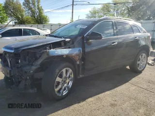 2011 Cadillac SRX Performance Collection z VIN 3GYFNBEY0BS613019, wystawiony jako Copart lot #54714595 z przebiegiem 113 444 mil mil oraz Szkoda całkowita • Salvage title. Historia ofert i sprzedaży dostępna na DreamBid. Obrazek 1.