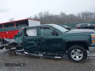 2014 Chevrolet Silverado 1500 LT with VIN 3GCUKREC1EG516826, listed as a IAAI auction lot 41119573 with 164,844 mi miles and . Bid and sale history available at DreamBid. Image 14.