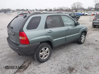 2005 Kia Sportage LX with VIN KNDJF723957038800, listed as a IAAI auction lot 41497596 with 122,189 mi miles and . Bid and sale history available at carsss.com. Image 4.