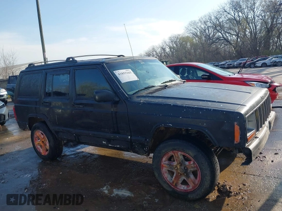 2000 Jeep Cherokee Classic with VIN 1J4FF58SXYL215871, listed as a IAAI auction lot 41855165 with 132,284 mi miles. Bid and sale history available at carsss.com. Image 13.