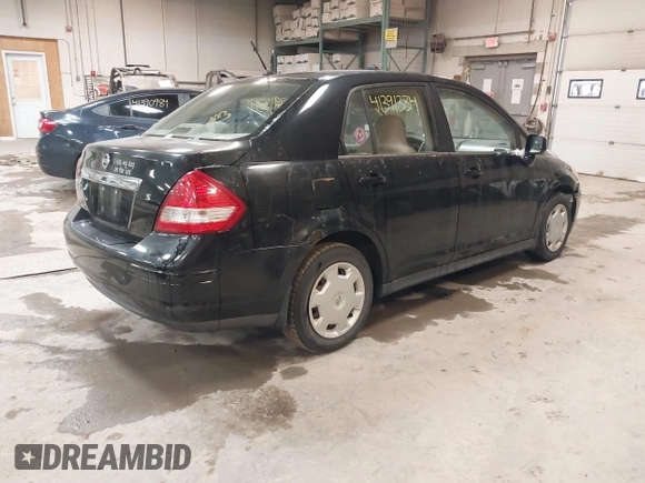 2007 Nissan Versa 1.8 SL with VIN 3N1BC11E47L411983, listed as a IAAI auction lot 41391334 with 201,830 mi miles. Bid and sale history available at carsss.com. Image 4.