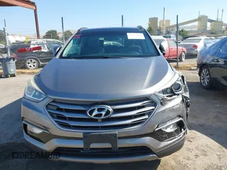 2017 Hyundai Santa Fe 2.4L z VIN 5XYZU3LB4HG446961, wystawiony jako IAAI lot #42214109 z przebiegiem 140 175 mil mil oraz . Historia ofert i sprzedaży dostępna na DreamBid. Obrazek 12.