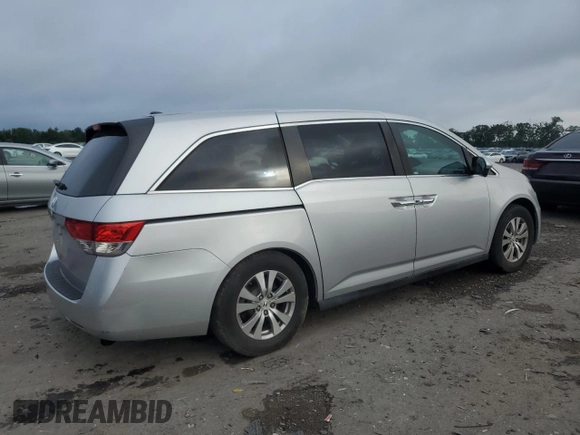 2014 Honda Odyssey EX-L with VIN 5FNRL5H62EB003236, listed as a Copart auction lot 63342255 with 147,398 mi miles and Salvage title. Bid and sale history available at DreamBid. Image 3.